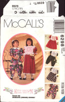 McCall's 6298 Kitty Benton Gourmet Sewing: Girls' Dress, Jumpsuit and Tabards, Uncut, Factory Folded Sewing Pattern Size 7