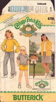 Butterick 6706 Cabbage Patch Kids Top, Vest, Skirt, Shorts and Pants with Transfer, Uncut, Factory Folded Sewing Pattern Size 12-14