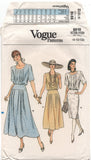 Vogue 9910 Sleeveless or Short Sleeve Blouson Bodice Dress with Straight or Flared Skirt, Uncut, Factory Folded Sewing Pattern Size 8-12